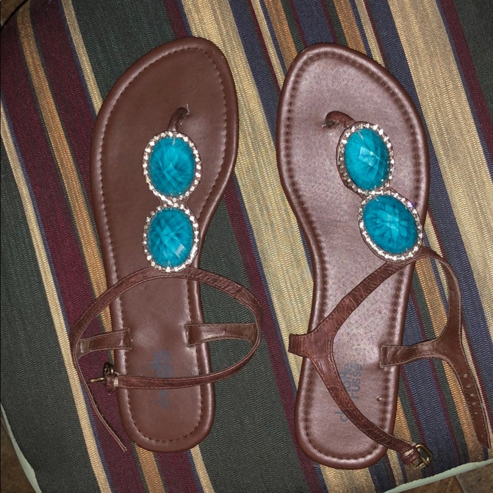 Cute brown flat sandals.